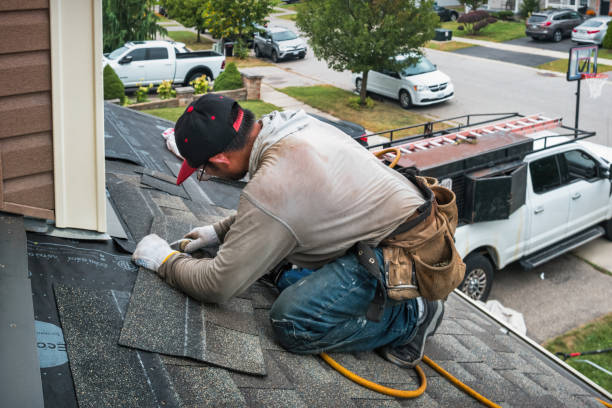 Professional Roofing technician working in West Falmouth, MA